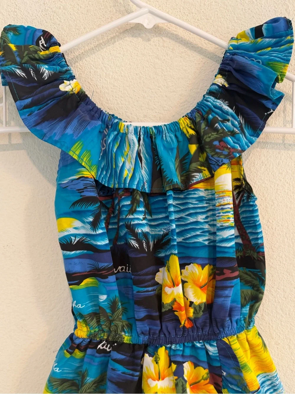 Girls Blue Tropical Ruffle Dress with Yellow Floral Accents